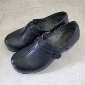 Dansko black leather clogs